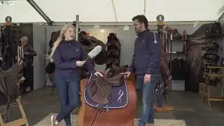 Chloe talks to Antares about her jumping saddle.