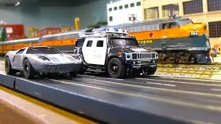 Model Motoring & Trains: Ford GT40 vs Hummer Slot Cars & Great Northern Train