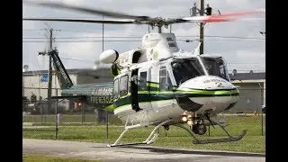 Impressive helicopter Bell 412 Miami Dade at Kendall Tamiami Executive airport   test and take off