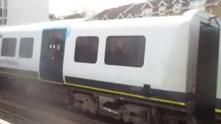 That Is a SWR Train Class 450086 And 450097 In Staines