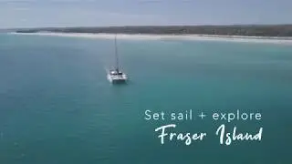 Sailing the remote coastline of Fraser Island, Queensland.