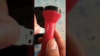 LED Flashlight With Mobile Charger