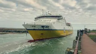 Car ferry sail out to sea trough narrow canal , Ship Seven Sisters. Newhaven to Dieppe