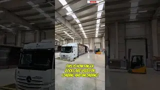 Loading pallets on a truck: Finger dock magic! Efficient warehouse loading.