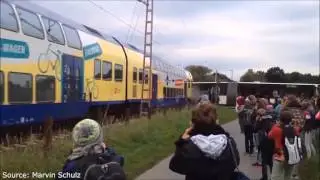Train collides with school bus stuck across tracks in Germany Video