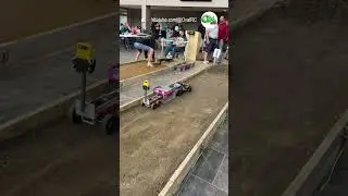 Traxxas Slash and Drag Slash RC trucks pulling at the Worlds