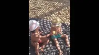 My cute twins sharing everything