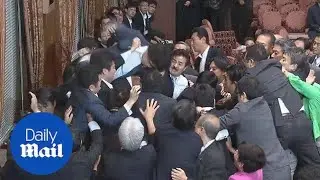 Chaotic scenes as Japan military bill approved - Daily Mail