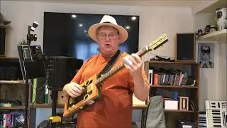 3 string Andalusian Bull Cigar Box Guitar by The English Guitar Company and played by Dogleg Steve