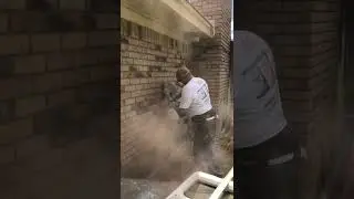 Cutting a new window in a brick wall