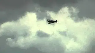 Sean D. Tucker playing in a 49.5 mph Gust Front at Oshkosh 2011