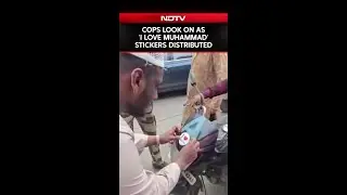 Cops Look On As 'I Love Muhammad' Stickers Distributed