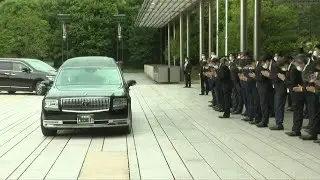 Hearse with Shinzo Abe's body passes PM's office in Japan's Tokyo | AFP