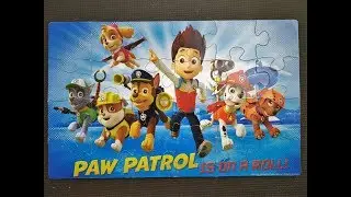 Paw Patrol puzzle with Ryder, Zuma, Marshall, Chase, Rubble, Sky, and Rocky.