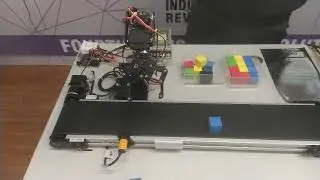 robot arm with conveyor  belt