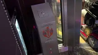 EPIC but BUSY MEI round Glass Elevator at the Cosmopolitan Chandelier Bar in Las Vegas, Nevada