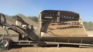 Almond shuttle cart unloading
