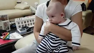 Sleeping baby funny video: baby watch tv and receive massage - Sebastian Adventures