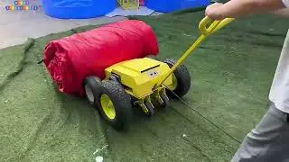 How to roll up a bounce house ? using an inflatable rolling machine .