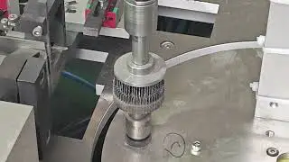 Shaft mounted flap wheel machine