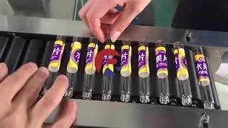 Automatic 5 -10ml glass tube labeling machine, sticker labels applicator system, RELIANCE