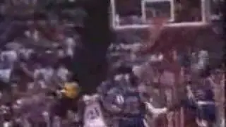 Spud Webb dunks over Manute Bol