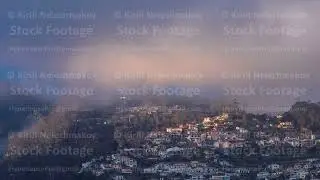 Sunset over houses on hill in Funchal, Madeira, Portugal timelapse