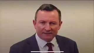 Mark McGowan - aboriginal woman translates English into English