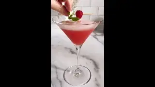 cocktail with muddle raspberries and mint and lemon juice and simple ryrup and...