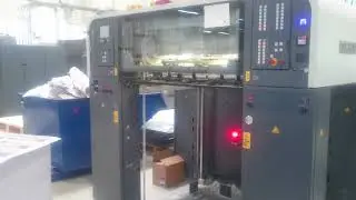 Man Roland 700 Evolution 1. printer running the machine with non stop!