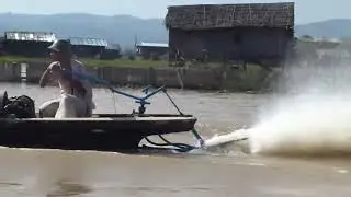 Speed boats on a river in Myanmar Burma in 2014