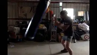 Roo Quan Kangaroo Kungfu Elbow strikes on boxing bag #martialartslife