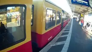 Blind passenger using tactile guidance strip at Berlin Lichtenberg.