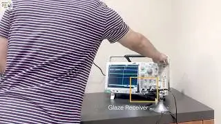 Glaze: Overlaying Occupied Spectrum with Downlink IoT Transmissions