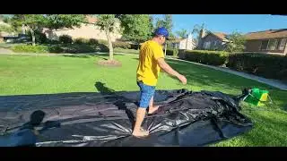 How to roll up an INTIMATE XL series 30ft inflatable movie screen by Superior Inflatables