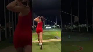 Fit Golfer Girl hitting bombs at Top Golf! #shorts #golfshorts #golfswing