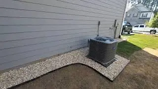 Decorative Gravel Installation around AC Unit by Brooks Landscaping | Foundation Waterproofing