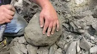 Jackhammering in shale to chase a good geode vein. This is to prove are geodes are not fake.