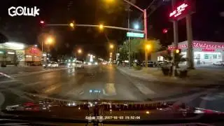 Driver turning when light is probably red...