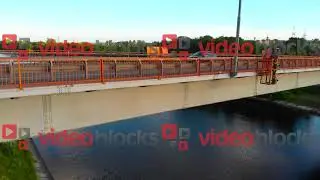 Aerial view of bridge crossing remote canal