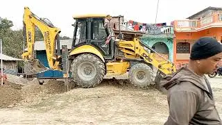 JCB working toywall foundations at construction site/dozers working/mud @RoadPlanet
