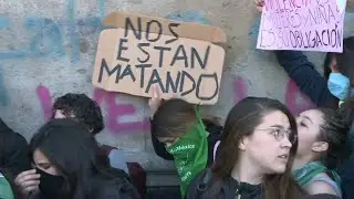 Women sloganeer against femicides in front of Mexico's National Palace | AFP