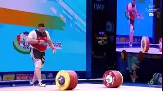 Drug cheat Lasha Talakhadze doing the catholic symbol before lifting world record