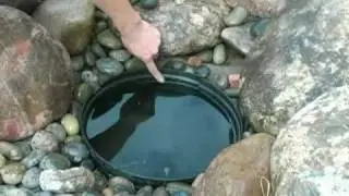 How to Install a Disappearing Waterfall Part 2 | Pondliner.com
