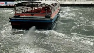 High Water Khlong Saen Saep Canal transportation vessel going backwards in Bangkok Thailand 4K