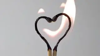 Fire in two sticks with heart shape 
