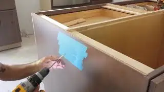 Cutting out for electric outlet in cabinet