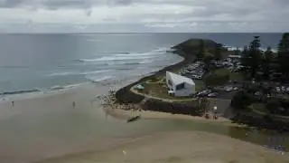Crescent Head Caravan Park and surf by drone.