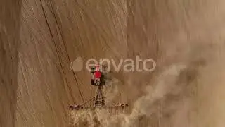 Field Cultivator At Work (4K Aerial Stock Footage)