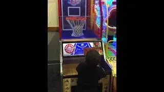 Chuck E Cheese. Fat daddy shooting hoops. Only missed one shot 